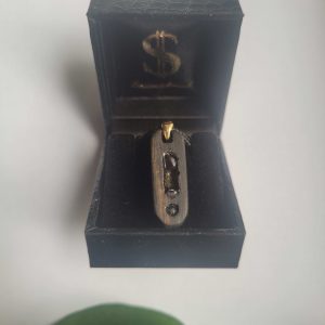 Saitenschmuck „Noten“ Halskette aus Makassar Ebenholz mit Amethyst und Granatstein