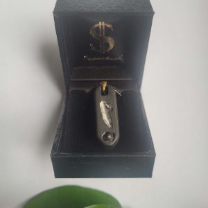 Saitenschmuck „Noten“ Halskette aus Ebenholz mit Granatstein